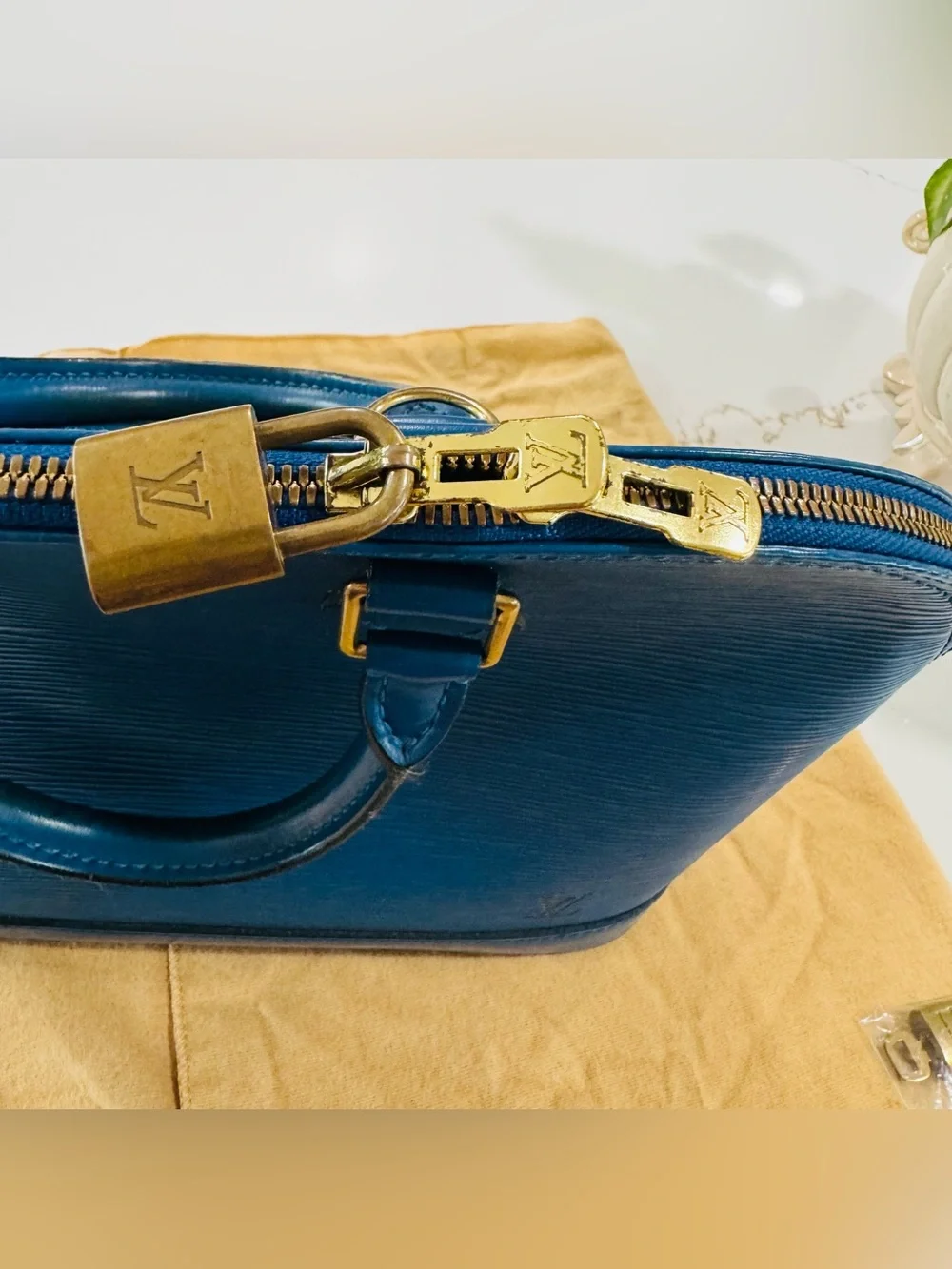 Louis Vuitton Blue Epi Alma Satchel with Gold Hardware